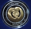 В Сбербанк поступили серебряные монеты с золотой пантерой, посвящённые Республике Тыва
